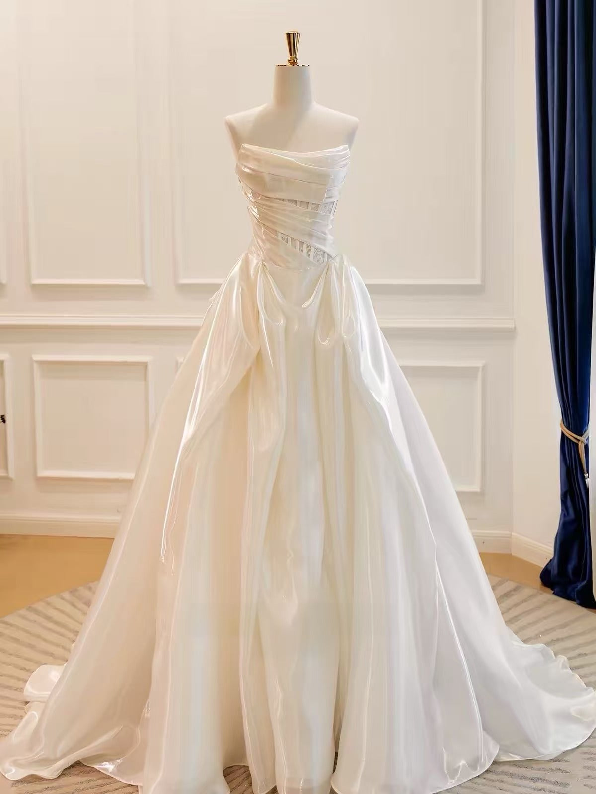 Elegant Ivory Strapless Ruched A-Line Prom Dress with Draped Bodice and Flowing Skirt